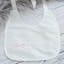 Silk Christening bib with ribbon detail